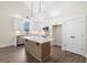 Modern kitchen with white cabinets, stainless steel appliances, and granite countertops at 160 Doris Path, Dallas, GA 30157