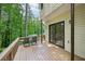 Relaxing back porch features outdoor seating and sliding glass doors leading to indoor spaces at 187 Timber Creek Sw Ln, Marietta, GA 30060