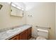 Functional bathroom featuring a vanity with marble countertop, ample storage, and accessibility features at 187 Timber Creek Sw Ln, Marietta, GA 30060