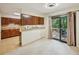 Bright dining area that connects to an adjacent kitchen and has sliding doors that open to the backyard deck at 187 Timber Creek Sw Ln, Marietta, GA 30060