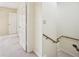Hallway features access to multiple rooms and stairs, leading to different parts of the house at 187 Timber Creek Sw Ln, Marietta, GA 30060