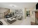 Cozy living room offering access to the stairwell and dining room area at 187 Timber Creek Sw Ln, Marietta, GA 30060