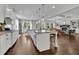 Bright and airy kitchen with a large island, granite countertops, stainless steel appliances, and an open layout at 238 Harmony Lake Dr, Canton, GA 30115