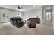 Cozy living room with reclining sofa set, gray paint and carpet at 238 Harmony Lake Dr, Canton, GA 30115