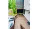 Spacious backyard deck overlooking the pool and lush landscaping, perfect for summer gatherings at 3748 Woodrose Ct, Snellville, GA 30039