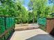 Outdoor deck overlooking the trees, providing a relaxing space for outdoor entertaining at 3748 Woodrose Ct, Snellville, GA 30039