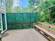 Large wooden deck with a private, green screen, perfect for outdoor entertaining at 3748 Woodrose Ct, Snellville, GA 30039