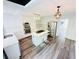 Spacious kitchen with modern appliances, a large center island, stylish lighting, and sleek countertops, perfect for cooking at 3748 Woodrose Ct, Snellville, GA 30039