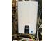 Navien brand wall-mounted water heater with energy star rating at 3748 Woodrose Ct, Snellville, GA 30039