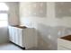 Bathroom vanity featuring white shaker cabinets and a window view for natural light at 7301 Staton Pl, Acworth, GA 30102