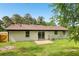 Single-story home featuring a patio and lawn in the backyard at 2744 Preston Dr, Decatur, GA 30034
