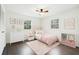 Stylishly staged bedroom with decor, carpet, and natural light at 2744 Preston Dr, Decatur, GA 30034