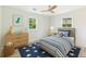 Charming bedroom with decor, including area rug, dresser, and bed at 2744 Preston Dr, Decatur, GA 30034