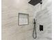 Detailed view of the tiled shower with rainfall showerhead and built-in niche at 2744 Preston Dr, Decatur, GA 30034