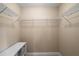 Walk-in closet with ample shelving and storage space at 299 Stockwood Dr, Woodstock, GA 30188