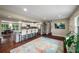 Open concept kitchen showcases granite counters, stainless appliances, and eat-in breakfast bar at 299 Stockwood Dr, Woodstock, GA 30188