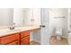 This bathroom features a single vanity, tile floors, and an alcove tub with shower at 3567 Sycamore Bnd, Decatur, GA 30034