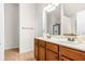 Bright bathroom featuring a double sink vanity and a glass enclosed shower at 3567 Sycamore Bnd, Decatur, GA 30034