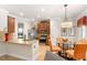Bright kitchen with stainless steel appliances, granite counters, and adjoining dining area at 3567 Sycamore Bnd, Decatur, GA 30034