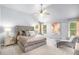 Serene main bedroom featuring a plush bed, vaulted ceiling, and soothing color palette at 3567 Sycamore Bnd, Decatur, GA 30034