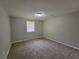 Cozy bedroom featuring neutral walls, carpet and natural light from a window at 4063 Feather Dr, Douglasville, GA 30135