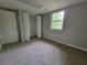 Bedroom with closet and natural light at 4063 Feather Dr, Douglasville, GA 30135