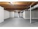 Open basement with painted walls and exposed ceiling at 4145 White Oak Dr, Winston, GA 30187
