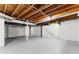 Unfinished basement features exposed ductwork and painted walls at 4145 White Oak Dr, Winston, GA 30187