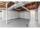 Spacious basement with painted walls and exposed ductwork at 4145 White Oak Dr, Winston, GA 30187