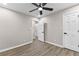 Bedroom featuring ceiling fan, closet, and a view through the doorway at 4145 White Oak Dr, Winston, GA 30187