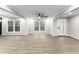 Airy living room with large windows, recessed lighting and neutral paint at 4145 White Oak Dr, Winston, GA 30187