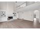 Open living area offers fireplace, built-in shelves, and high ceilings at 2111 Fernbank Way, Dacula, GA 30019