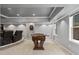 Finished basement features a foosball table, carpet floors, and natural light at 249 Thorncliff Lndg, Acworth, GA 30101