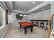 Finished basement with a pool table, carpet, and accent lighting at 249 Thorncliff Lndg, Acworth, GA 30101