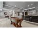 Finished basement featuring a movie area, foosball table, and pool table at 249 Thorncliff Lndg, Acworth, GA 30101