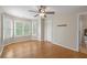 This bedroom has lots of sunlight from its bay windows along with hardwood flooring and access to a bathroom at 249 Thorncliff Lndg, Acworth, GA 30101