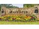 Stone entrance sign for Bentwater, surrounded by colorful flowers and landscaping at 249 Thorncliff Lndg, Acworth, GA 30101