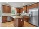 Modern kitchen features granite countertops, stainless steel appliances and wooden floors at 249 Thorncliff Lndg, Acworth, GA 30101