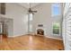 Spacious living room featuring a stone fireplace, wood floors and high vaulted ceilings at 249 Thorncliff Lndg, Acworth, GA 30101