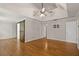 This large bedroom offers a tray ceiling, hardwood floors, barn door and an ensuite bathroom for convenience at 249 Thorncliff Lndg, Acworth, GA 30101