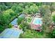 Aerial view of Avondale Swim and Tennis Club featuring tennis courts and a large outdoor pool at 50 Dartmouth Ave, Avondale Estates, GA 30002