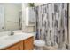 A bathroom featuring a vanity with neutral finishes and a shower with patterned curtain at 1418 Foxhall Se Ln # 18, Atlanta, GA 30316