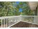 Outdoor wooden deck area offering views of surrounding trees and greenery at 1418 Foxhall Se Ln # 18, Atlanta, GA 30316