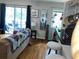 Cozy living room with a patio, hardwood floors, and modern decor, perfect for relaxing or entertaining at 1418 Foxhall Se Ln # 18, Atlanta, GA 30316