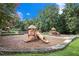 The playground area has slides, climbing structures, and lots of room to run and play at 1418 Foxhall Se Ln # 18, Atlanta, GA 30316
