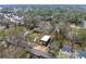 Panoramic aerial view showcasing the modern home, neighborhood, and surrounding greenery at 2402 Lynn Iris Dr, Decatur, GA 30032