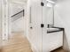 Bright bathroom featuring a white vanity with a black countertop at 2402 Lynn Iris Dr, Decatur, GA 30032