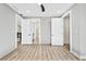 Bedroom with multiple doors, wood-look floors and a ceiling fan at 2402 Lynn Iris Dr, Decatur, GA 30032