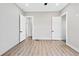 Spacious bedroom with modern ceiling fan, large windows, and LVP flooring throughout at 2402 Lynn Iris Dr, Decatur, GA 30032