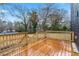 View of backyard deck with wooden railings at 2402 Lynn Iris Dr, Decatur, GA 30032
